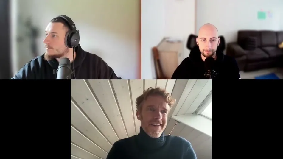 Three men are shown in a video call layout. The top left shows a man with a beard and headphones looking to his right. The top right shows a bald man with a beard looking towards the viewer, with a dark brown sofa in the blurry background. The bottom center shows a man with reddish-brown curly hair and a beard, smiling at the viewer.